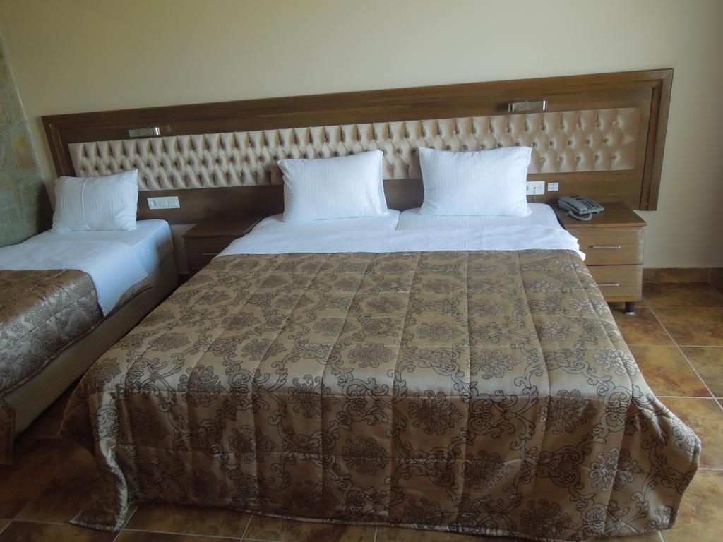 Masi Hotel İmroz Quarto foto